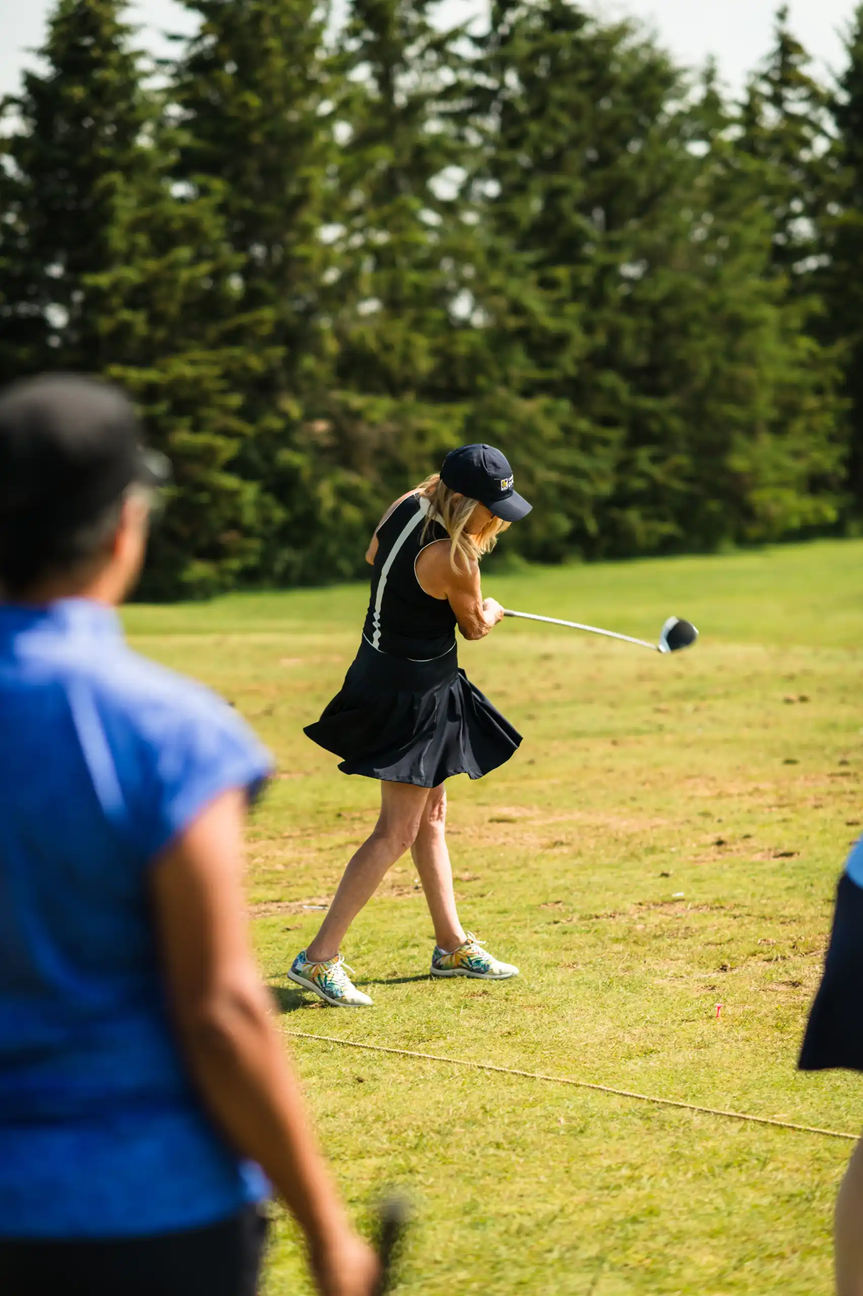 A golfer’s follow-through on a Whitby course
